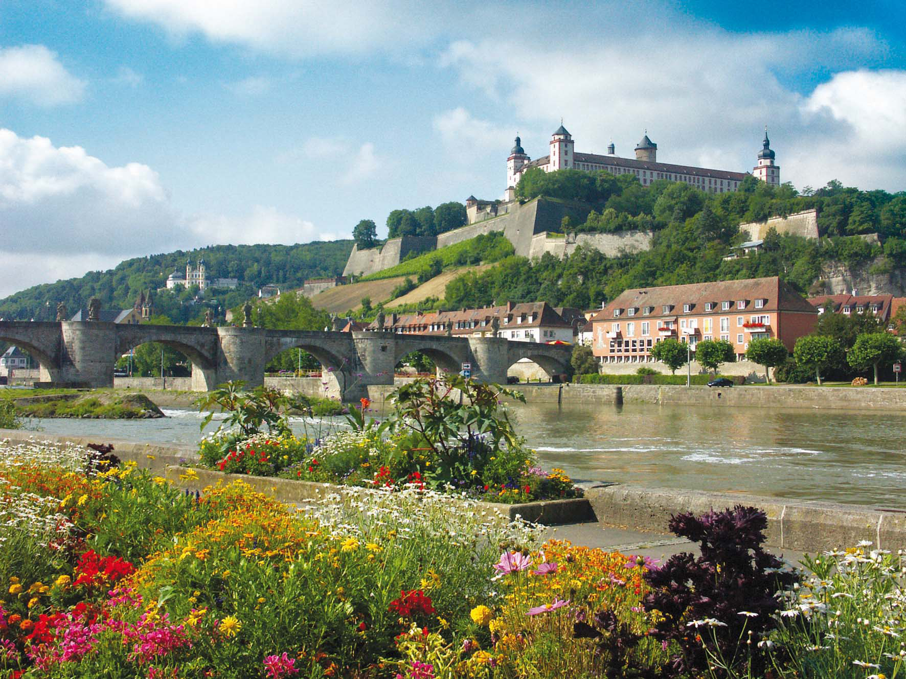 View of the Marienberg Fortress on a hill above the River Main and the Old Main Bridge